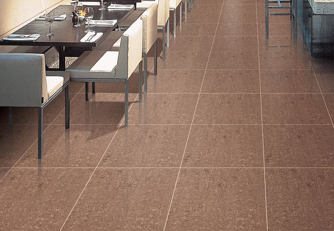 Olympia Regal Flamed Finish Porcelain Tiles Color: Blue, Charcoal, Charcoal Black, Chocolate Brown, Cream, Dark Grey, Gold, Grey, Light Mocha, Noce brown, Olive, Royale Crema, Royale Nero, Sand Beige, Shell White, Taupe, Jet Black Size: 12x12, 12x24